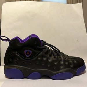 2 pairs of used Jordan’s, purple Jordan’s 6.5 GC, red Jordan’s are 8 M